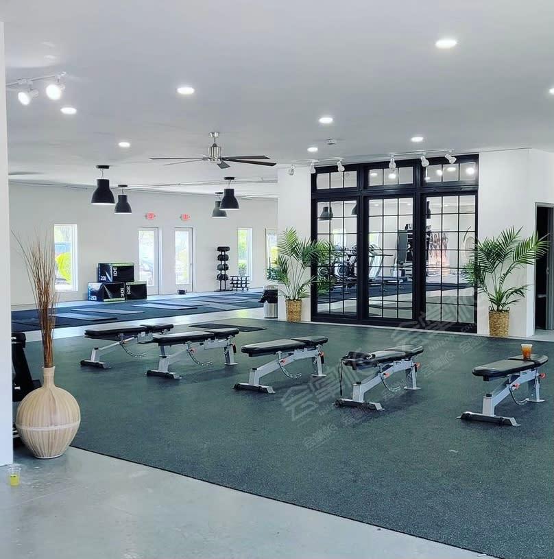 Fresh New Urban Boutique Fitness Studio with Abundant Lighting and Large Open Spaces.