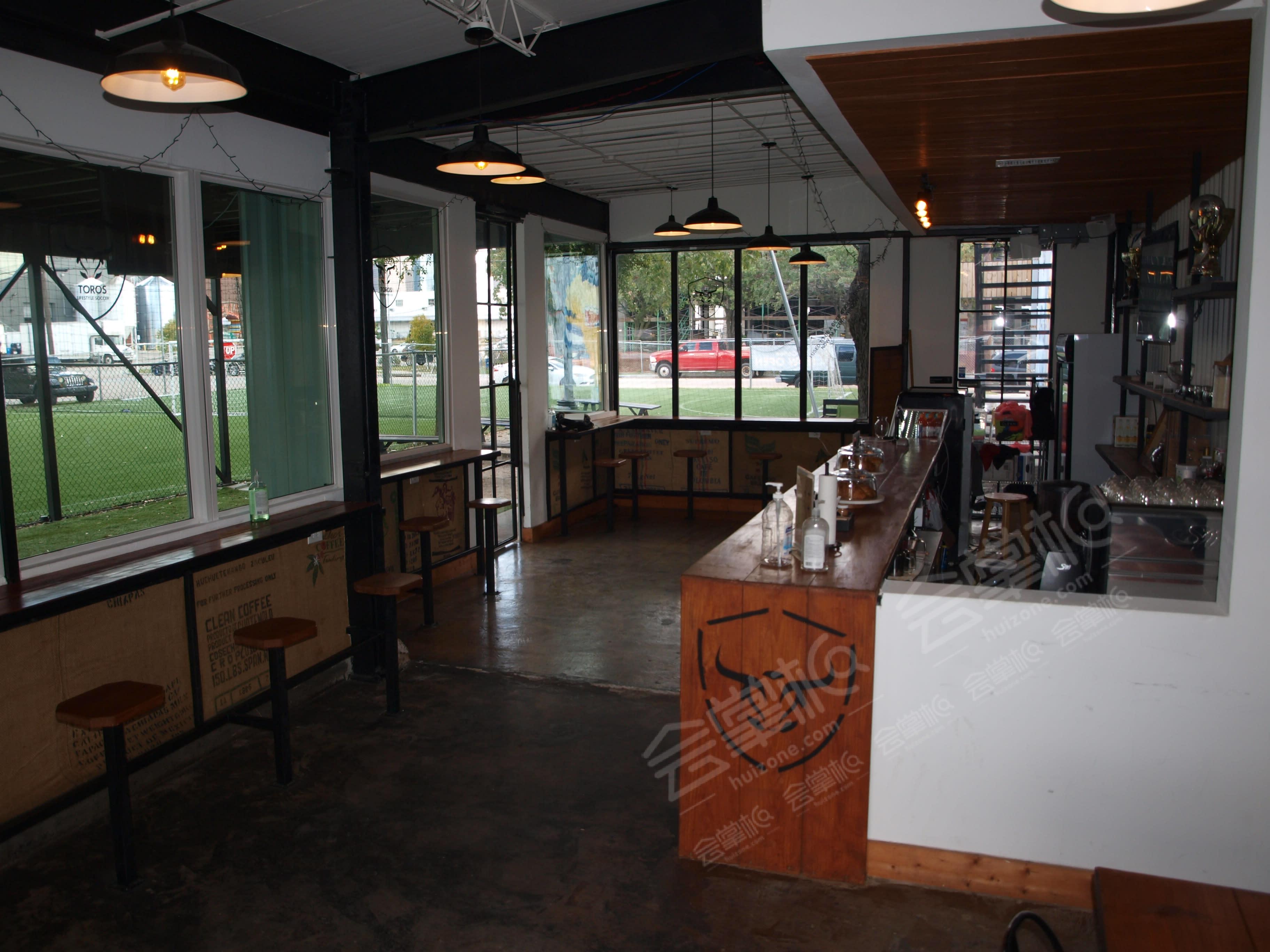 Spacious Cafe Event Space with Skyline View (indoor + outdoor hybrid)