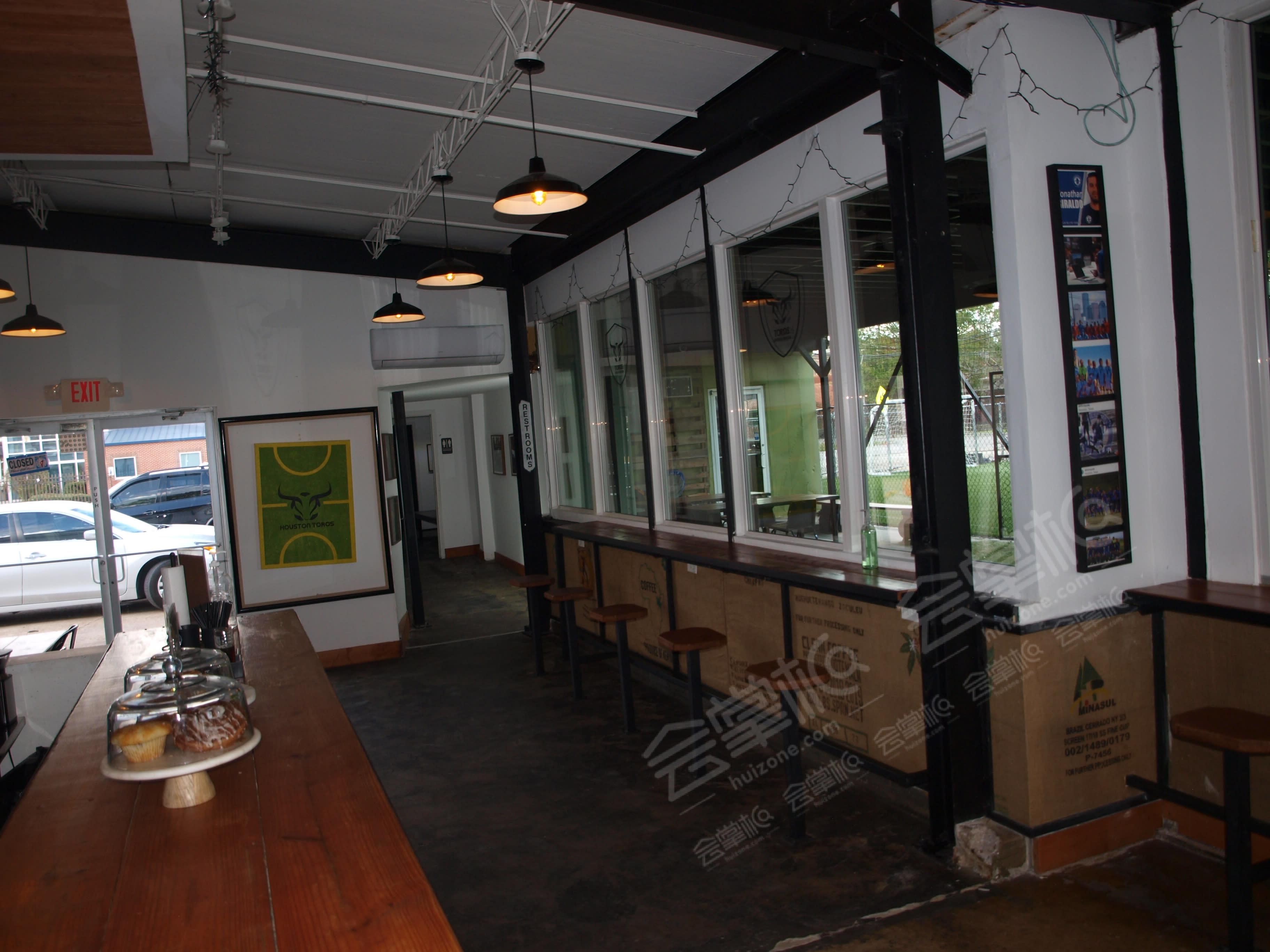 Spacious Cafe Event Space with Skyline View (indoor + outdoor hybrid)