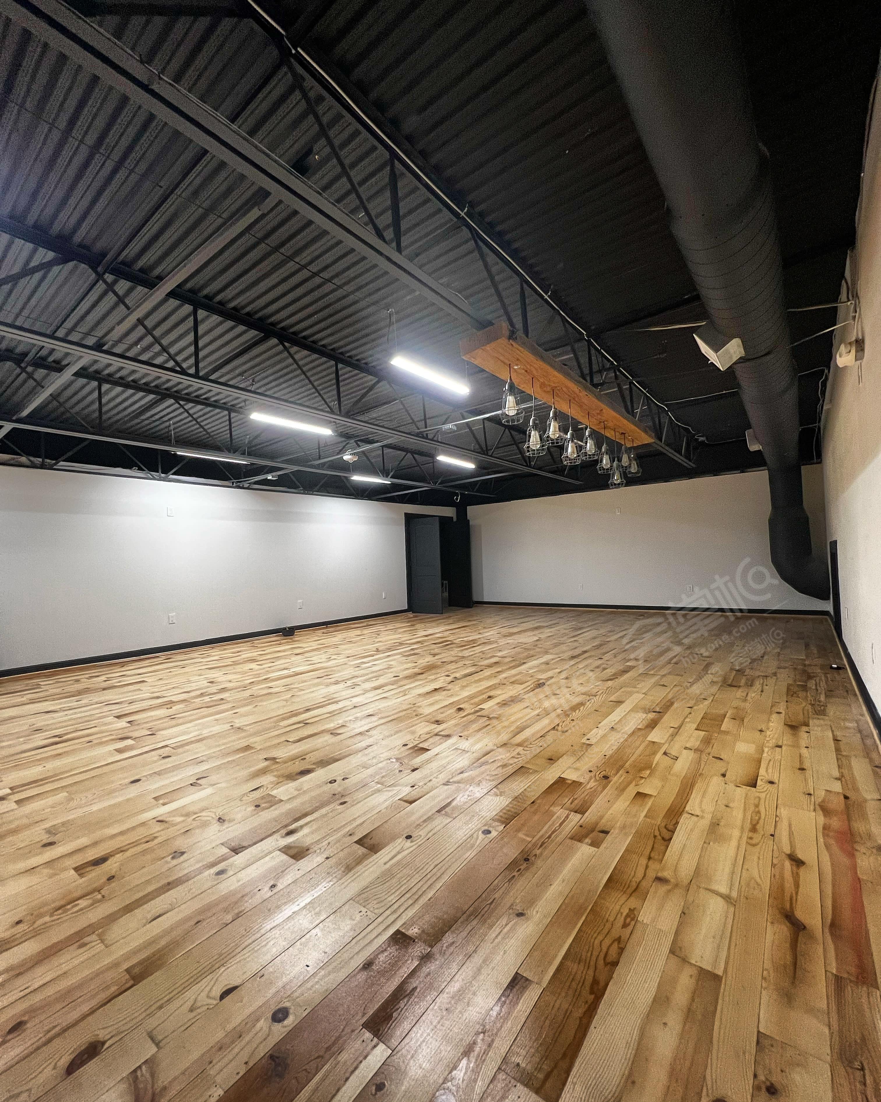 Modern/industrial studio space with wood flooring located near IAH Airport,  59N and FM1960