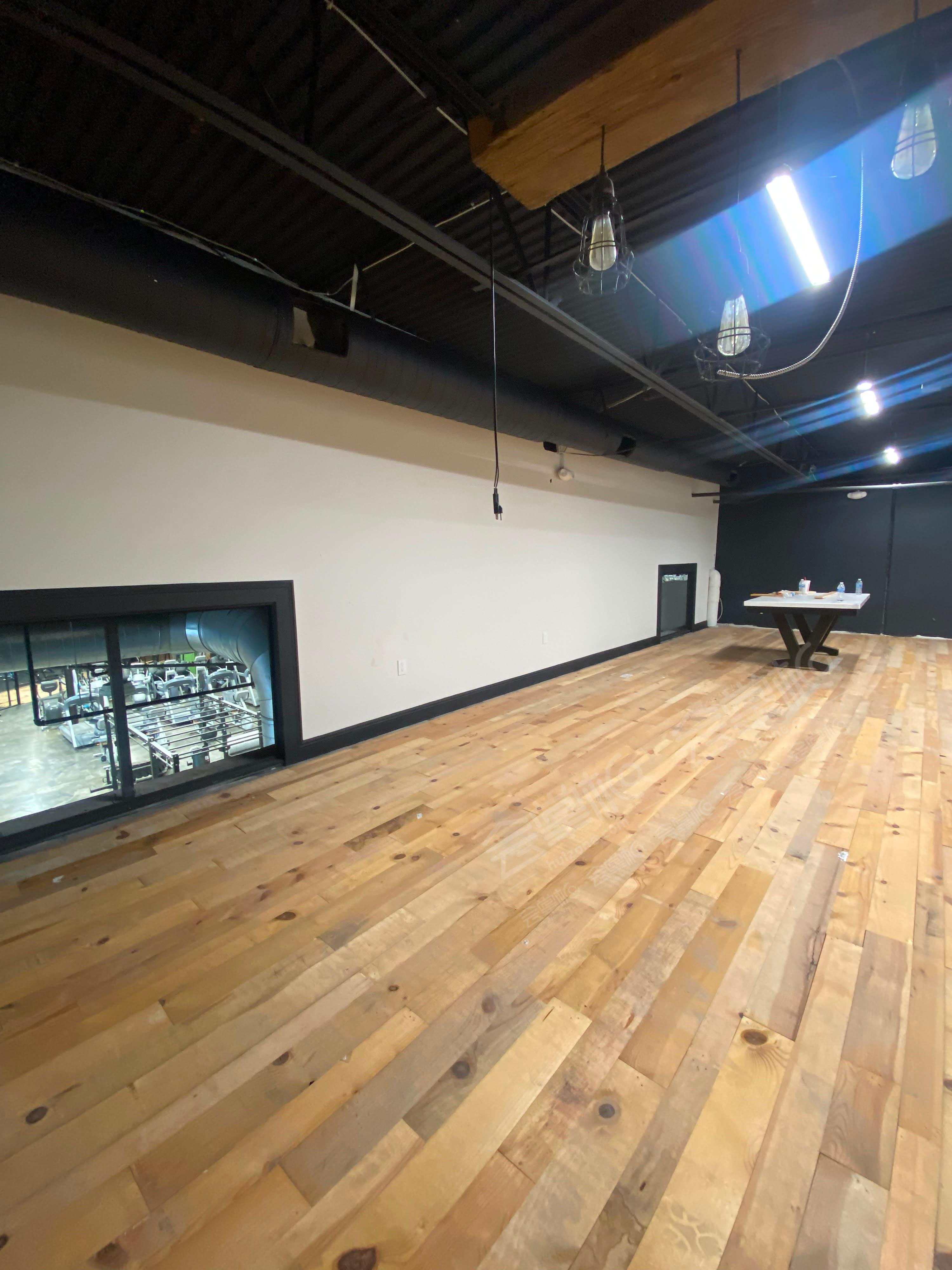 Modern/industrial studio space with wood flooring located near IAH Airport,  59N and FM1960