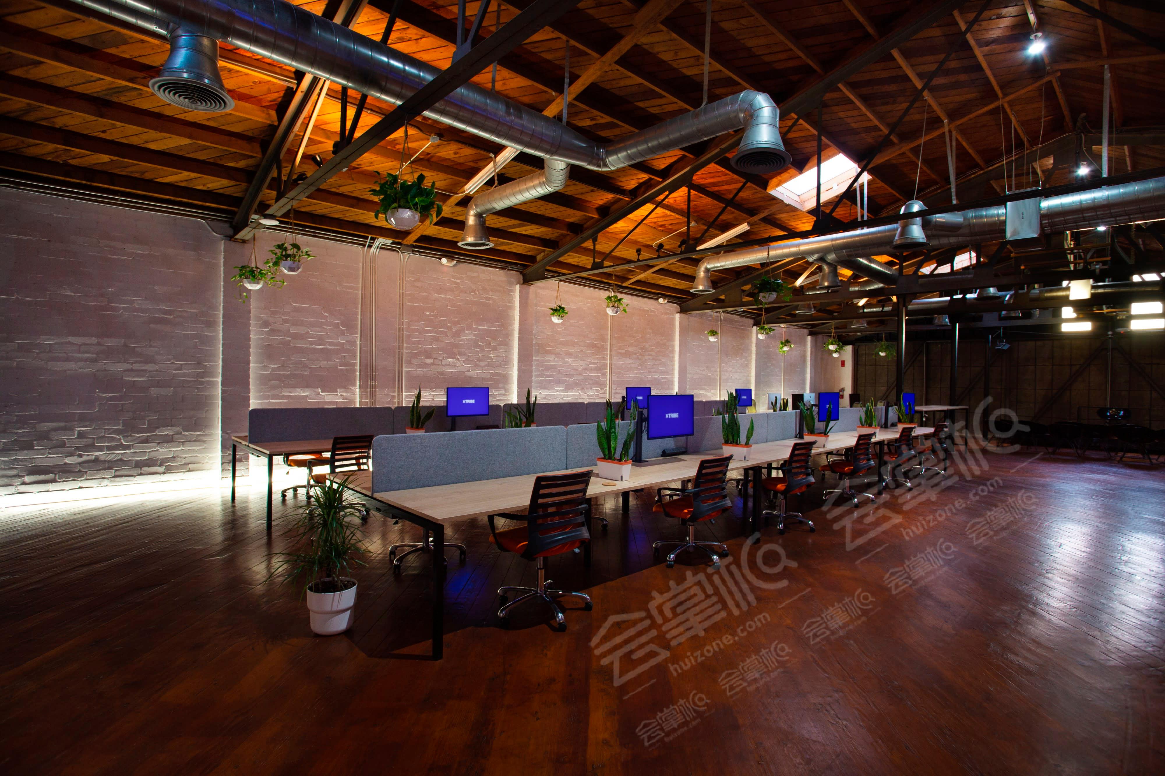 Private Coworking Space with 62 Desks, Event Stage, Kitchen and 3 Restrooms