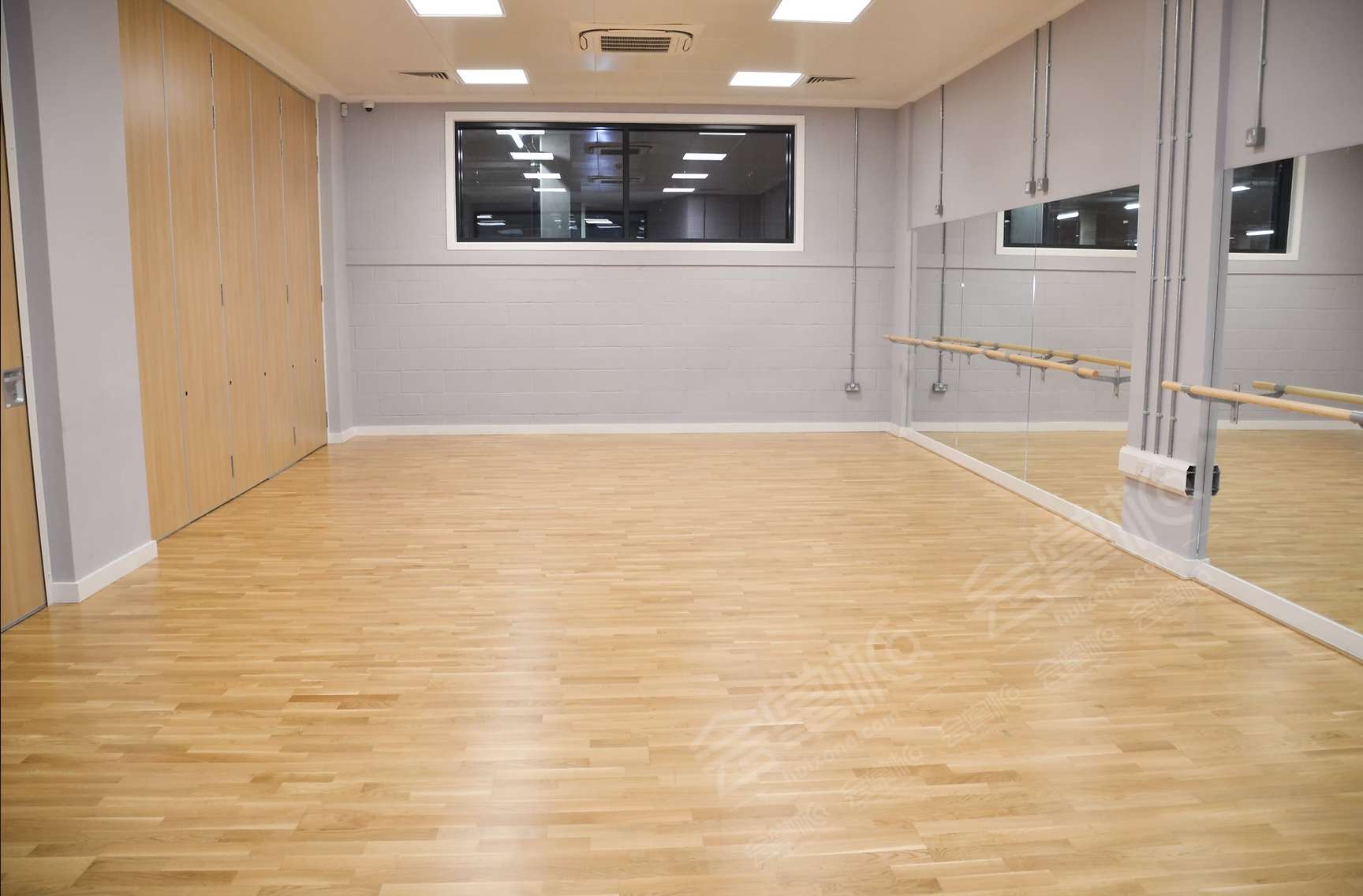 Event and Performance Space with Room Splitter and Mirrored Wall in Acton