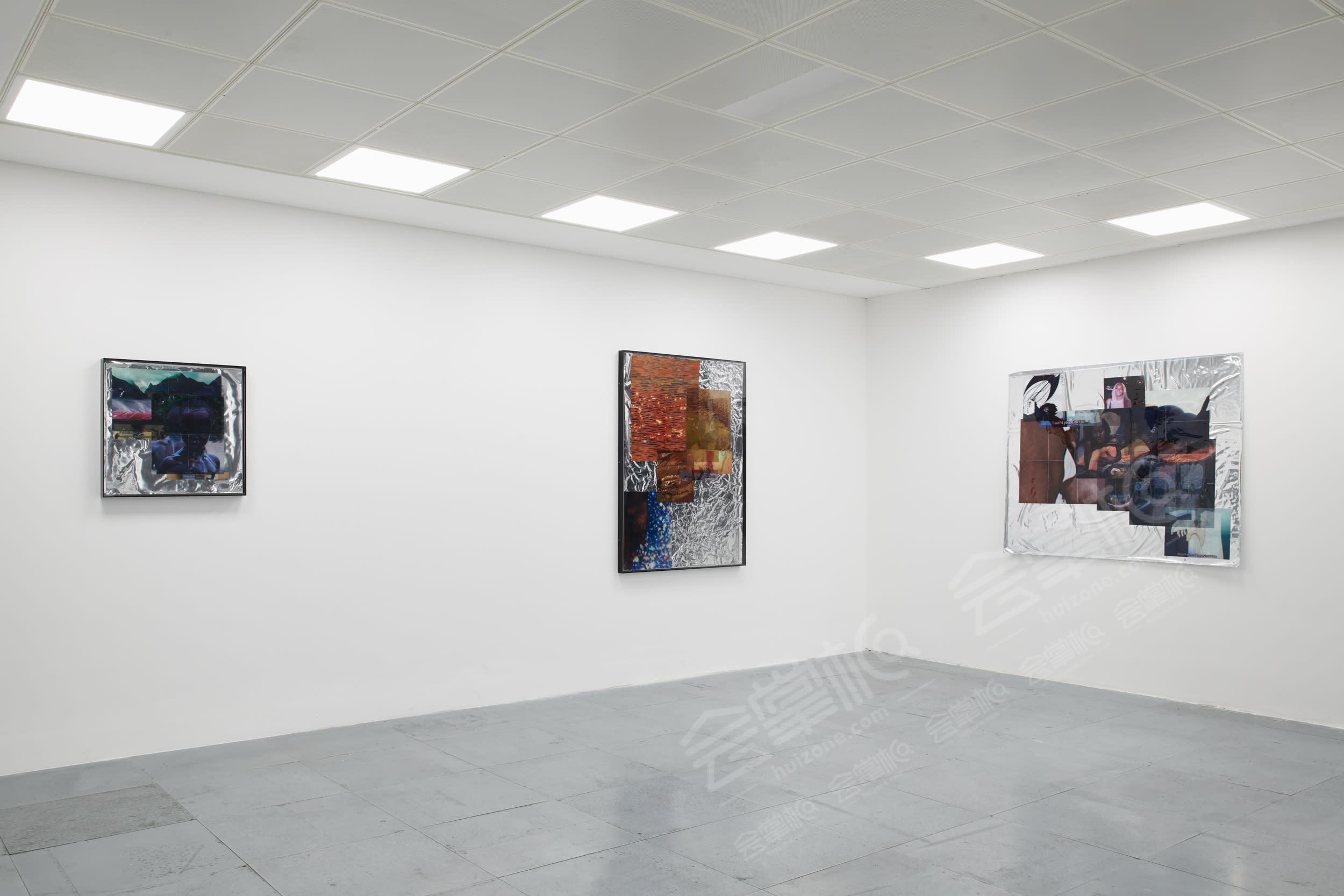 A modern, light and bright blank space gallery with white walls and modern metal flooring
