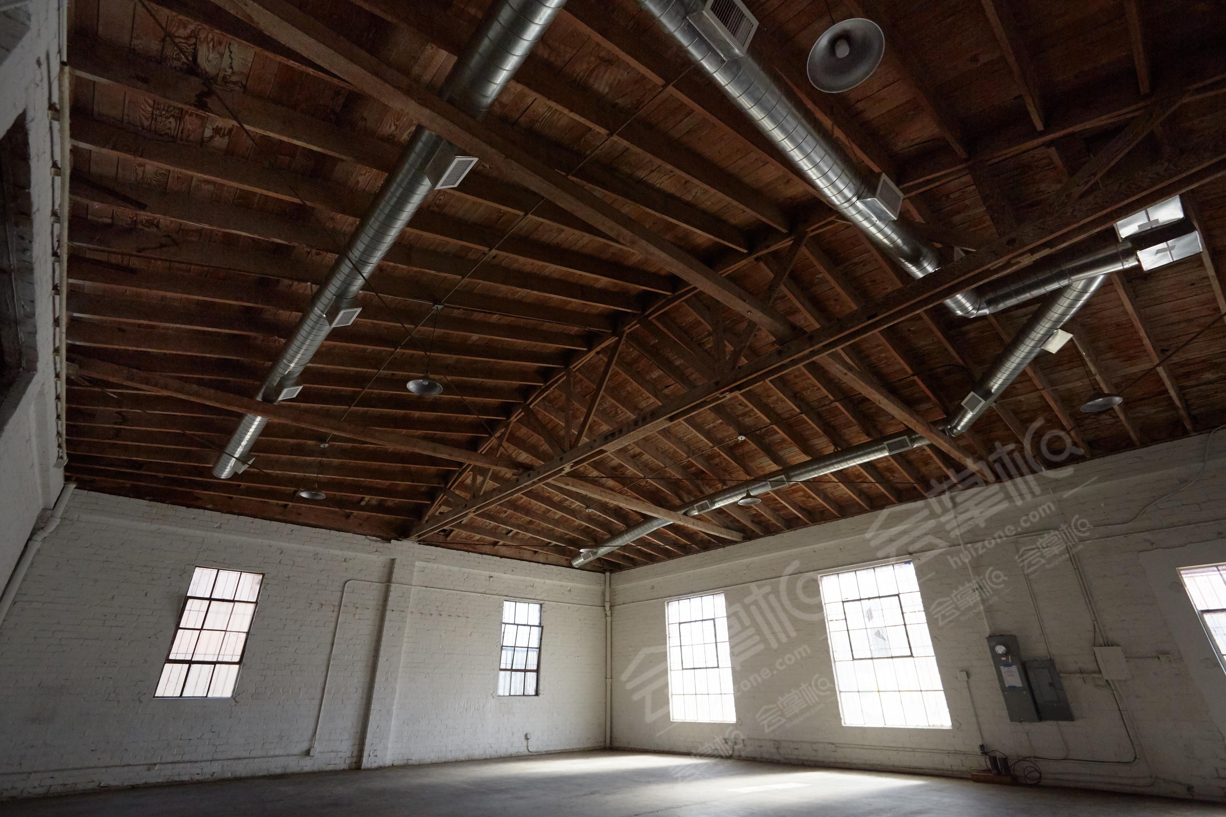 Downtown Brick Warehouse with Bowed Wooden Beams