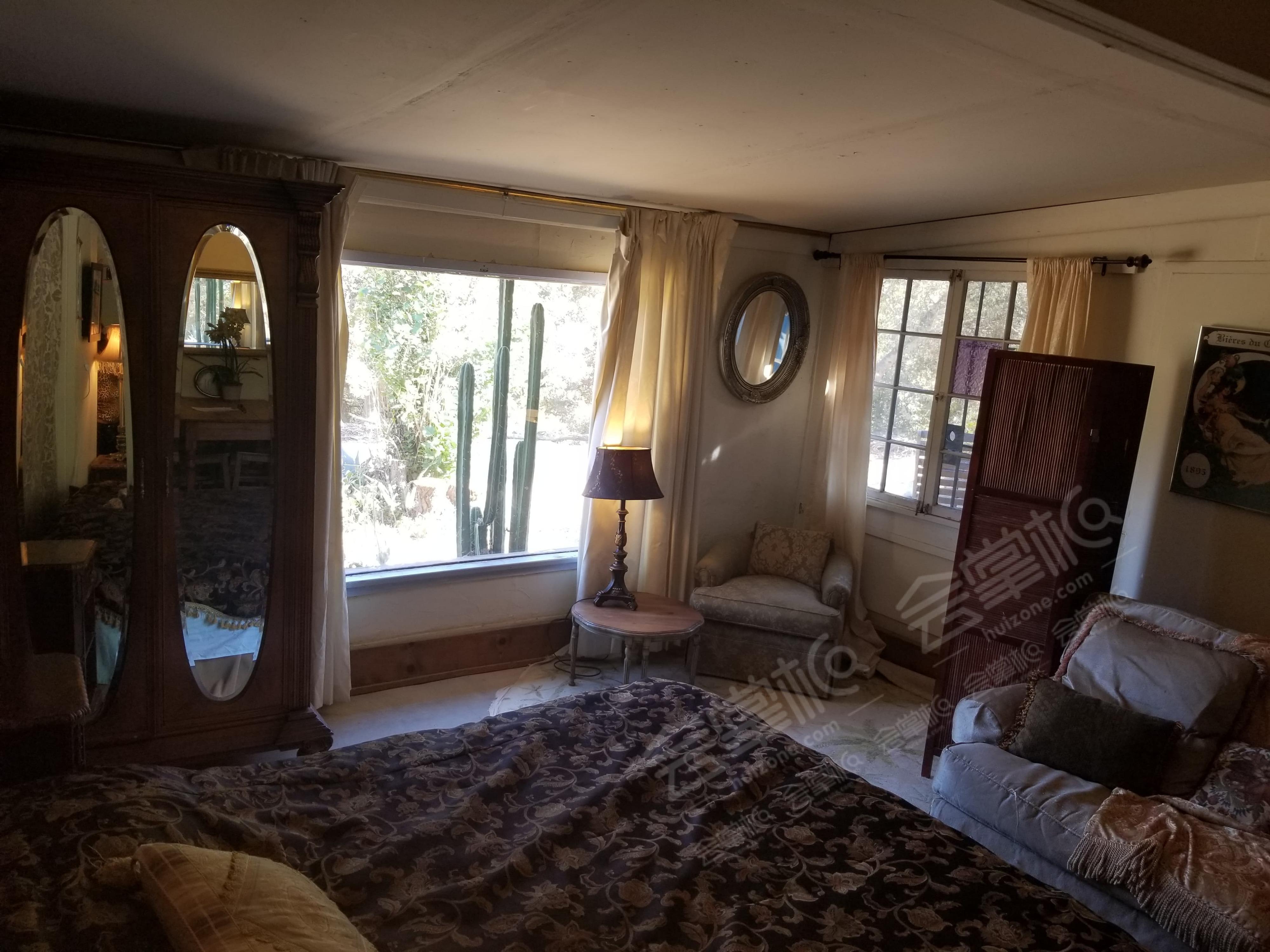 Incredible 13 acre ranch with a dozen artistic rustic cottages surrounded by nature